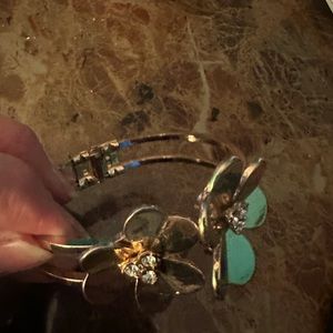 18k gold plated bracelet , no color changes, beautiful design.